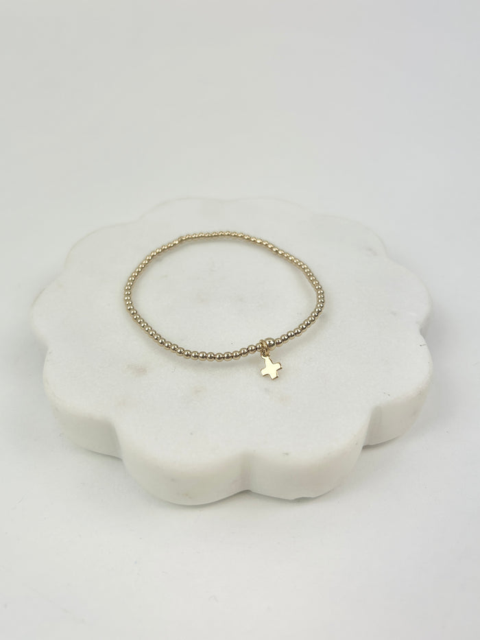 eGirl Signature Cross Small Charm 2mm Gold Bracelet Bracelets in at Wrapsody