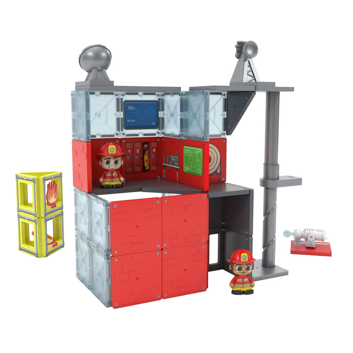 The Moose Toys Tile Town Fire Station Tile Set by Moose Toys includes red and gray building blocks, magnetic tiles, control screens, two firefighter figures in red helmets, a sliding pole, yellow fire-symbol blocks, and a small white fire hose.