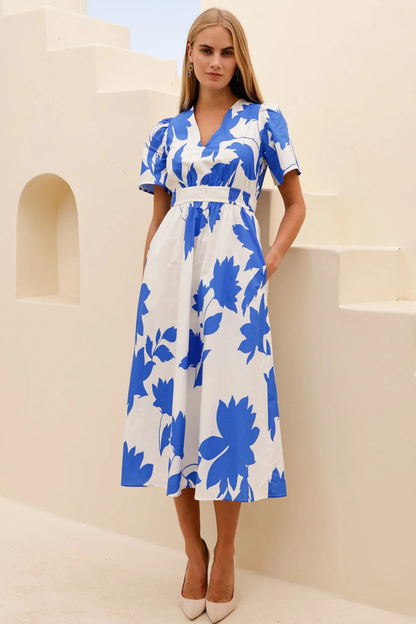 Aspiga Elsa Printed Cotton Midi Dress Ivory Cobalt by aspiga with puff sleeves and elastic waist Shop aspiga at Dotique