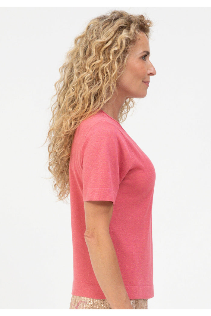 Side profile of model wearing Bianca 78029 Rabea Fine Knit Top Dark Tulip by bianca, shop bianca at Dotique
