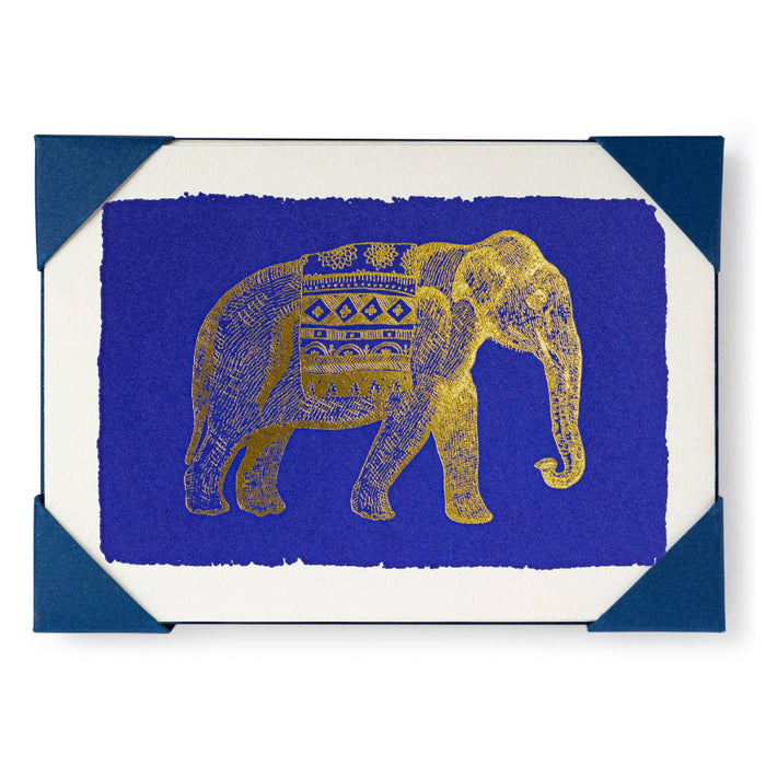 Card with a gold elephant design on a blue background