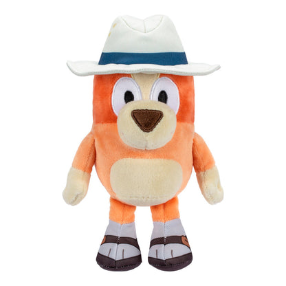 The Bluey & Friends Plushie by Moose Toys features an orange and cream dog with a white hat, blue band, brown shoes, and a friendly face. This upright plush is perfect for fans of Bluey stuffed animals.