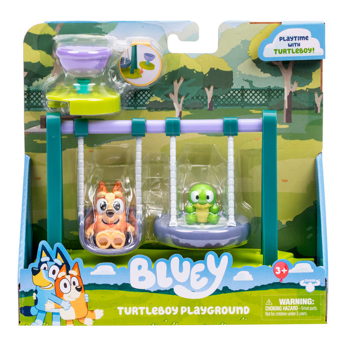 Bluey and Bingo hug on the Bluey Mini Playset & Figures packaging by Moose Toys, which includes collectible playsets with Bluey and Turtleboy figures on swings and a purple and green hourglass toy.