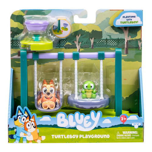Bluey and Bingo hug on the Bluey Mini Playset & Figures packaging by Moose Toys, which includes collectible playsets with Bluey and Turtleboy figures on swings and a purple and green hourglass toy.