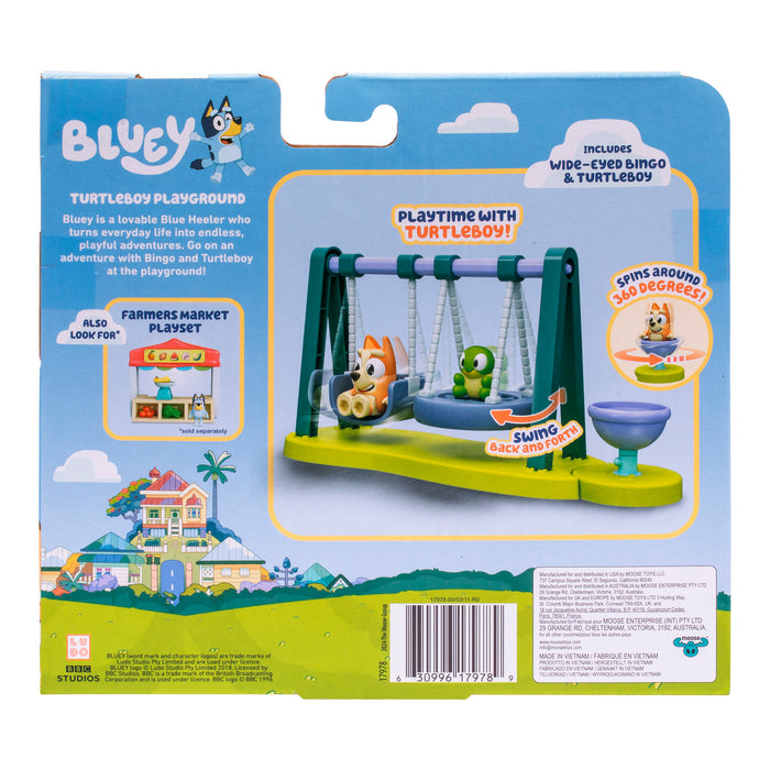 The image shows the back of a Moose Toys Bluey Mini Playset & Figures package, featuring the Turtleboy Playground with Bingo and Turtleboy on a swing, highlights of play features, collectible sets, and a colorful house at the bottom.
