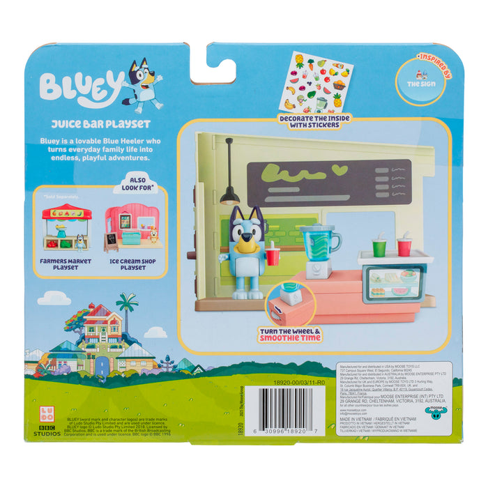 Back of Moose Toys Bluey Mini Playset & Figures packaging shows figure, blender, cups, and counter. Instructions highlight adding stickers and turning a wheel for smoothie-making fun—ideal for fans of collectible playsets!.