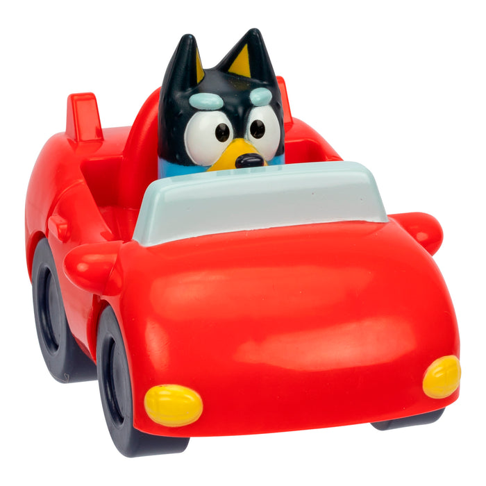 The Bluey Mini Racers from Moose Toys feature a collectible cartoon dog figure with black and blue fur sitting in a bright red convertible, perfect for fans of toy vehicles.