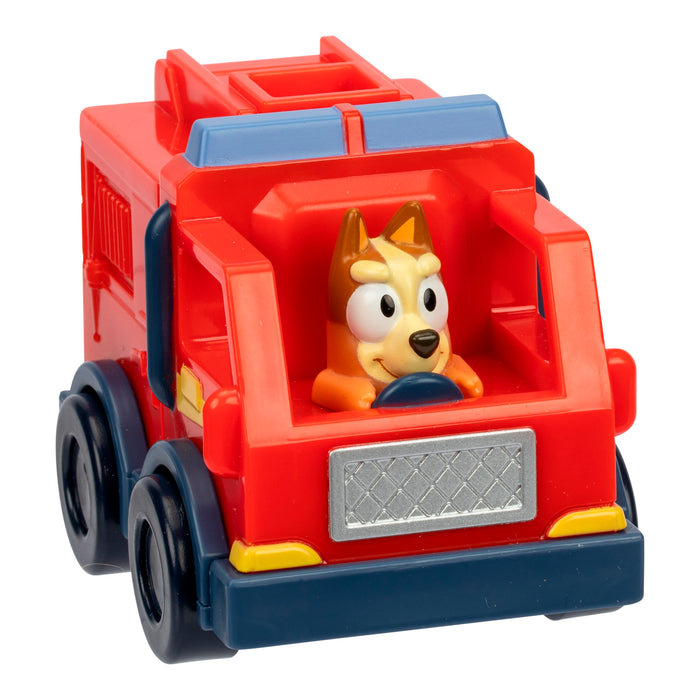 The Bluey Mini Racers by Moose Toys is a small red fire truck featuring a smiling cartoon dog figure at the wheel—a fun collectible toy vehicle perfect for any kids’ toy collection.