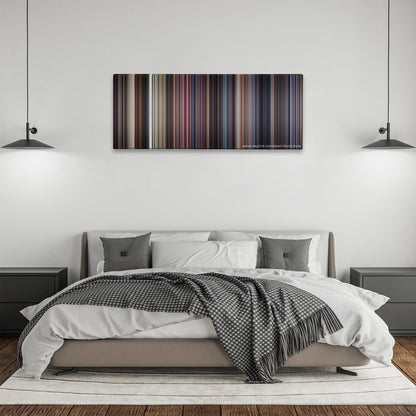 Boogie Nights color palette canvas above a bed, between two black pendant lamps