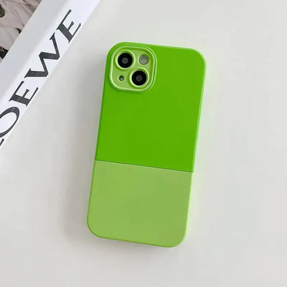 The green iphone case is next to a magazine
