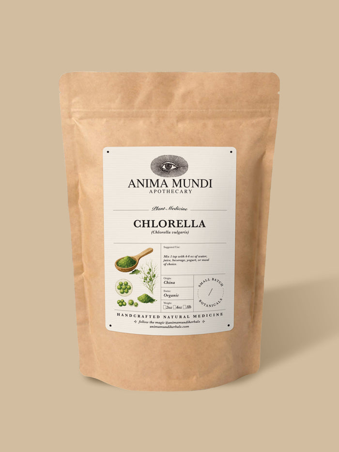 A kraft paper stand-up pouch of Anima Mundi Apothecary Ashwagandha herbal supplement, shown on a solid beige background.