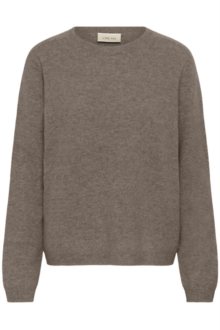 Shop the Cream CRMela Jumper in Java Melange at Dotique. A luxurious 100% wool jumper with a classic crew neck, regular fit and timeless everyday style.