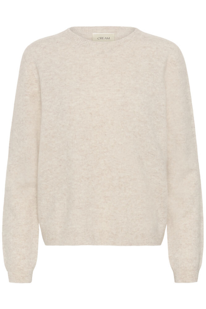 Shop the Cream CRMela Jumper in Oat Melange at Dotique. A luxurious 100% wool jumper with a classic crew neck, regular fit and timeless everyday style.