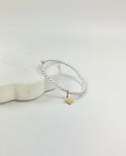eGirl 3mm Pearl Signature Cross Charm Bracelet Bracelets in at Wrapsody