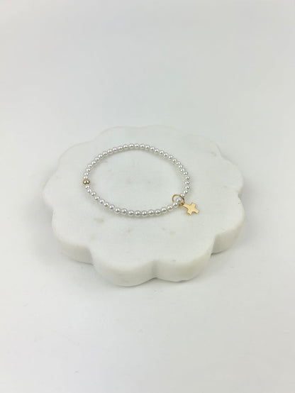 eGirl 3mm Pearl Signature Cross Charm Bracelet Bracelets in at Wrapsody