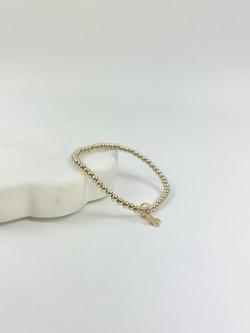 eGirl 3mm Signature Cross Charm Gold Bracelet Bracelets in at Wrapsody