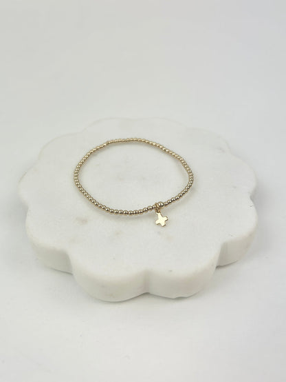 eGirl Signature Cross Small Charm 2mm Gold Bracelet Bracelets in at Wrapsody