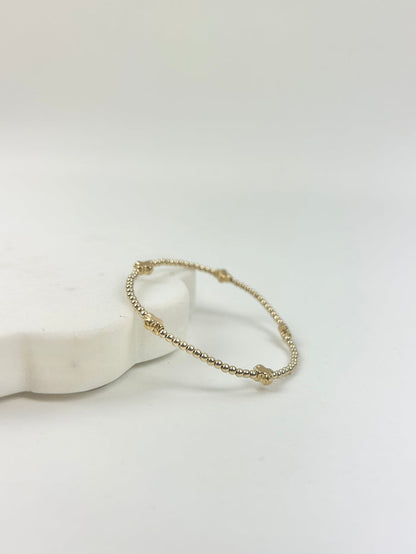 eGirl Signature Cross Small Pattern 2mm Bracelet - Gold Bracelets in at Wrapsody
