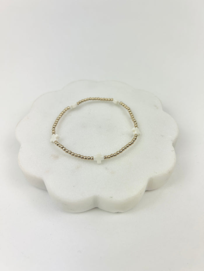 eGirl Signature Cross Small Pattern 2mm Bracelet - Off White Bracelets in at Wrapsody
