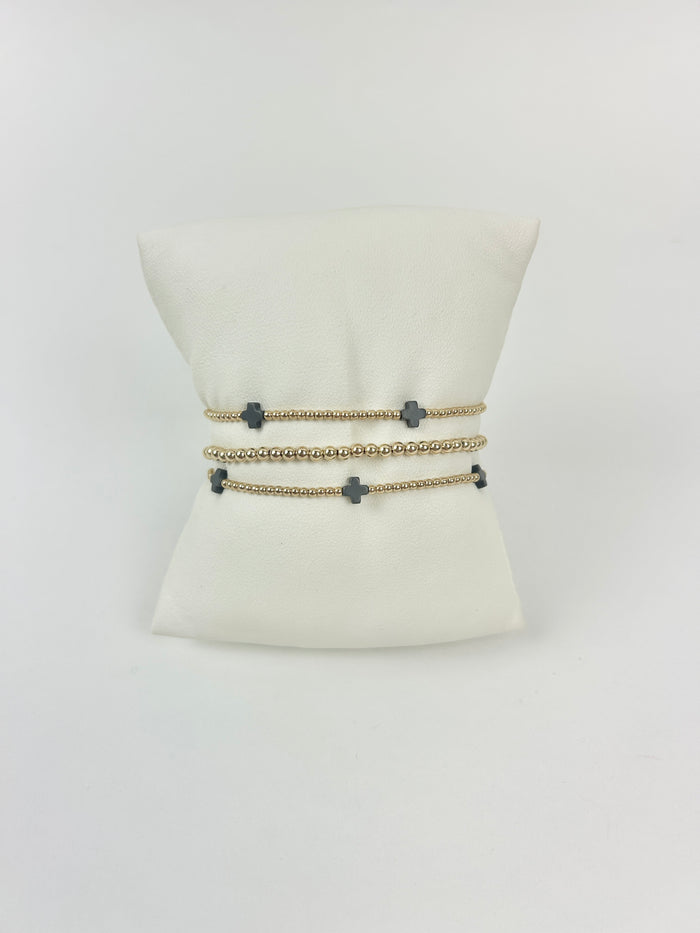 Enewton Small Signature Cross Gold 2mm Charcoal Bracelet Stack Bracelets in at Wrapsody
