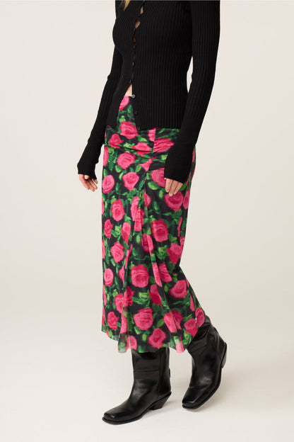 Model wearing Fabienne Chapot Jessy Midi Skirt Fab Fuchsia/Black with black top and boots, shop Fabienne Chapot at Dotique