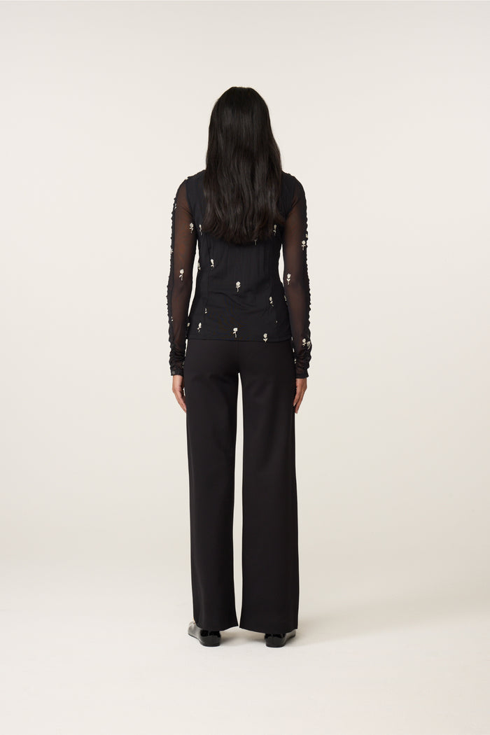 Woman wearing Fabienne Chapot Kamea Top Black/Cosy White by Fabienne Chapot, shop Fabienne Chapot at Dotique.