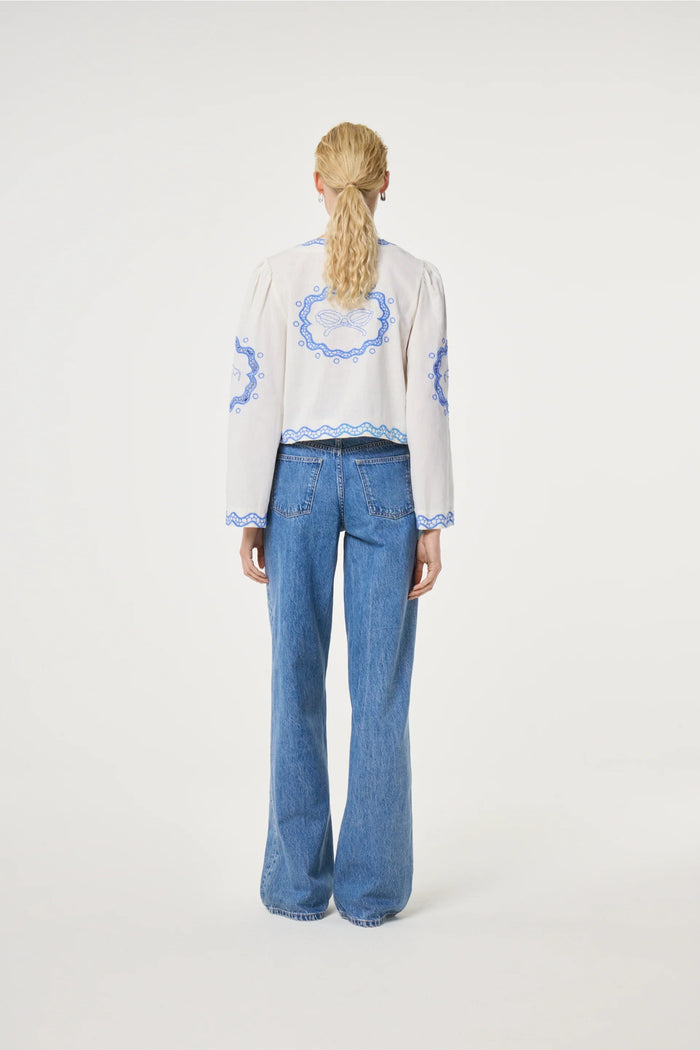 Back view of model wearing Fabienne Chapot Serviette Blouse Cosy White/Blue by Fabienne Chapot, shop Fabienne Chapot at Dotique