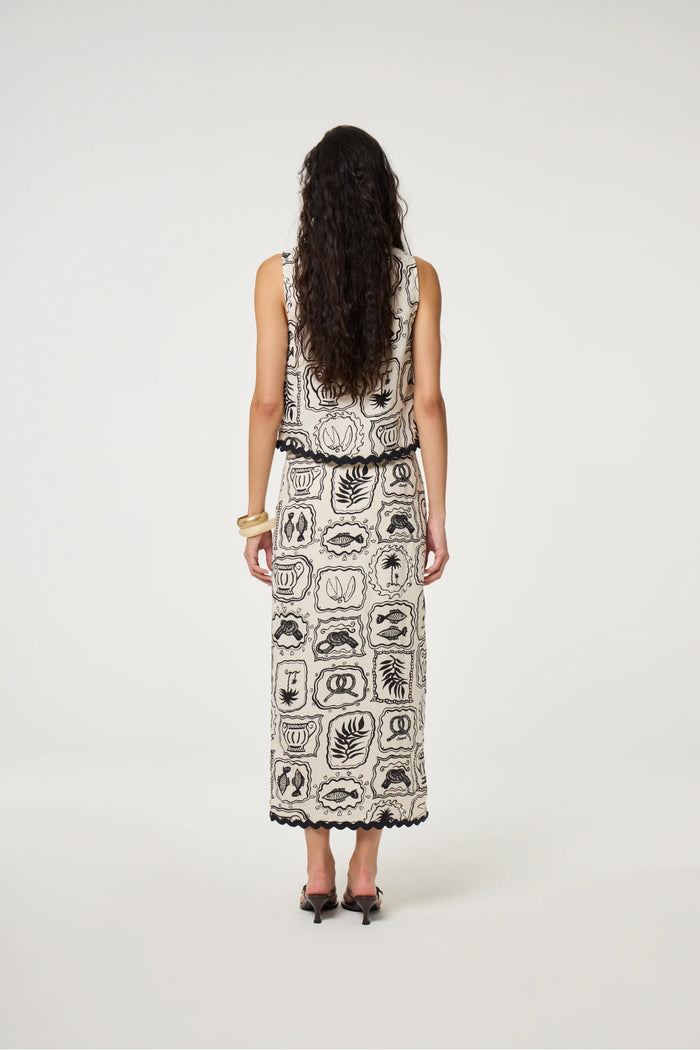 Back view of model wearing Fabienne Chapot Tila Skirt Cosy White/Black by Fabienne Chapot, shop Fabienne Chapot at Dotique