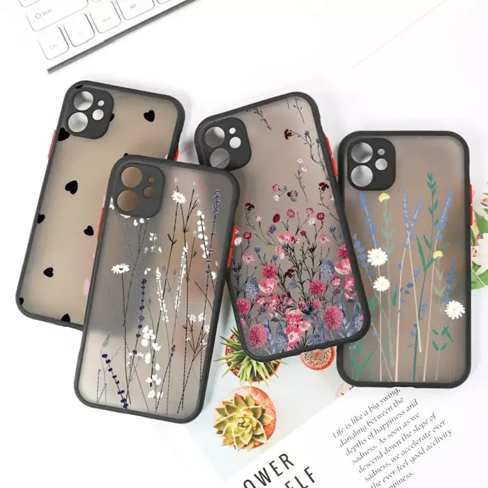 Three iphone cases with flowers and leaves