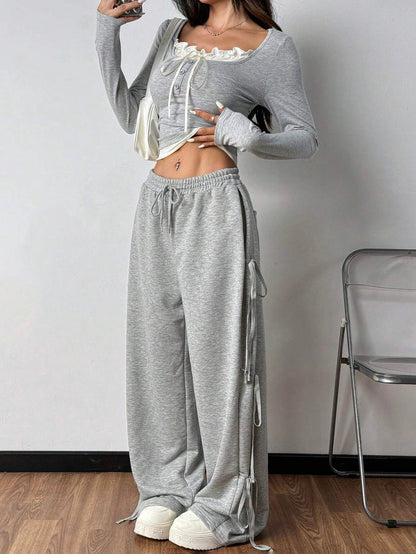 FRILL TRIM FRONT TIE LONG SLEEVE TOP & DRAWSTRING WIDE LEG PANTS