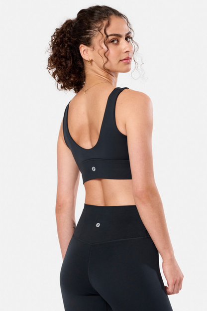 Woman wearing Gym + Coffee Soft-Motion Bra Black by Gym+Coffee, shop the vendor at Dotique for activewear styles.