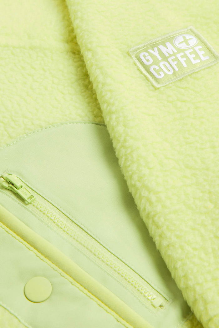 Close-up of Gym + Coffee Horizon Layer Up Jacket in in Lime Sorbet by Gym+Coffee showing texture and zipper, shop Gym+Coffee at Dotique