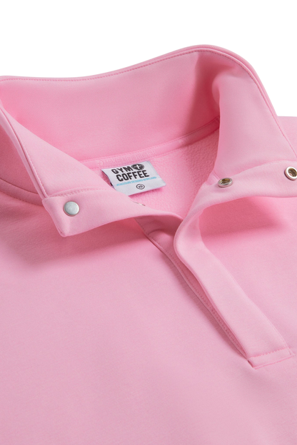 Close-up of Snap Collar High Waist Sweatshirt Pink Blossom by gym+coffee, shop gym+coffee at Dotique in soft pink fabric.