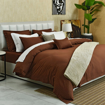 Mocca 7-piece duvet cover set with brown quilted duvet and matching pillows