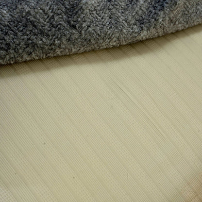 Cream satin duvet cover with subtle striped weave and visible seam