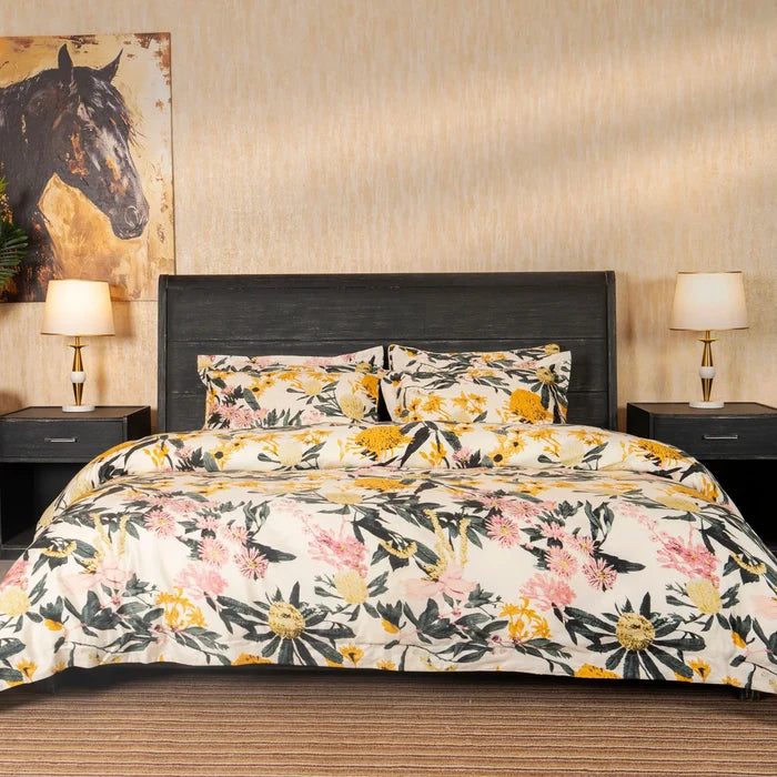 Floral bed set with cream duvet and pillowcases, yellow flowers and pink accents