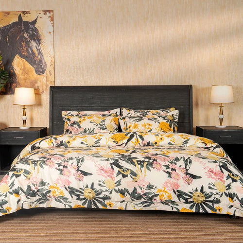 Floral bed set with cream duvet and pillowcases, yellow flowers and pink accents