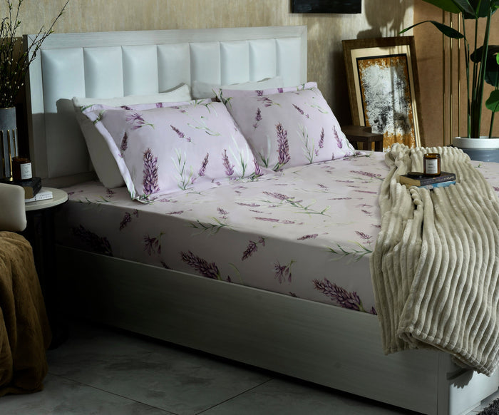 Lilac microfiber summer bed sheet with purple lavender floral pattern on bed