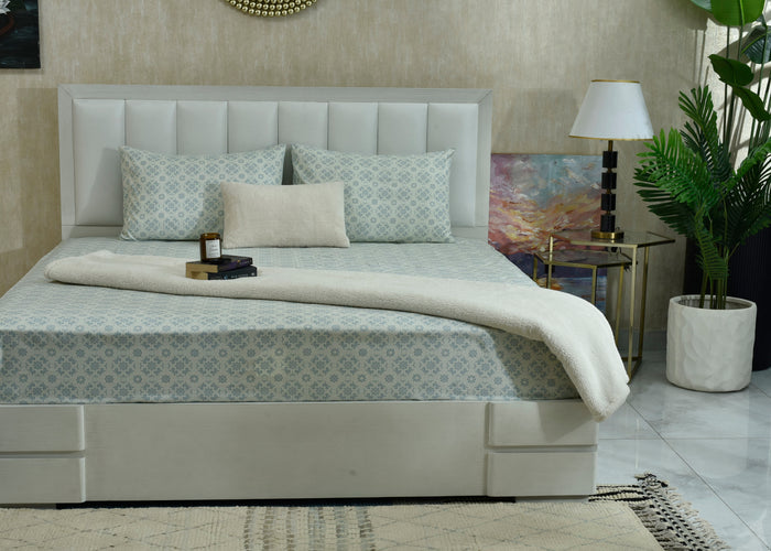 Ice blue cotton sateen bed sheet with ornate patterned surface