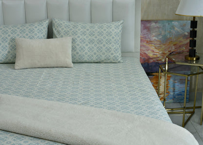 Ice blue cotton sateen bed sheet with matching patterned panel and corner