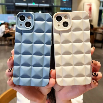 A pair of iphone cases with a white and blue design