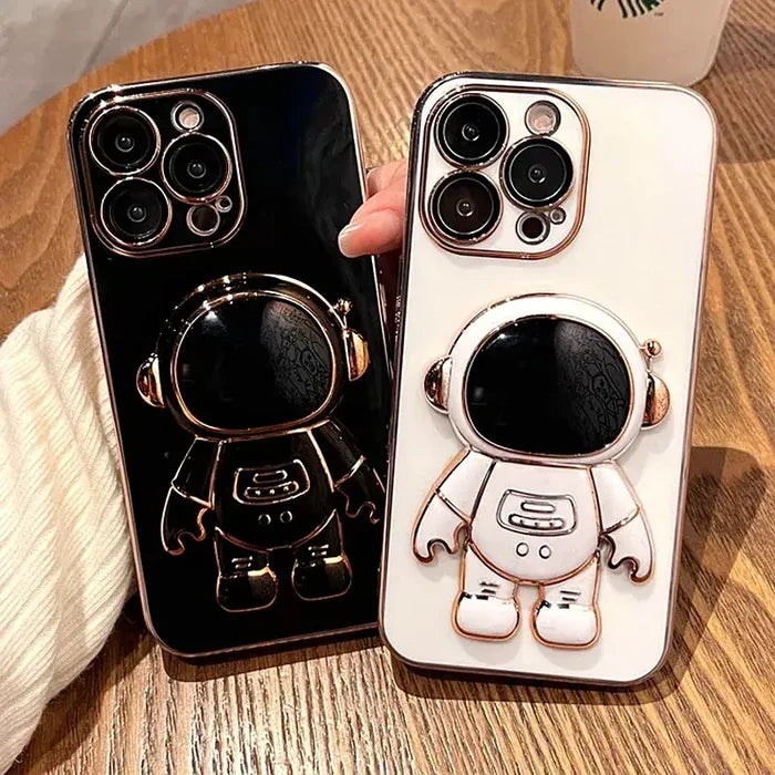 A person holding a phone case with a cartoon character