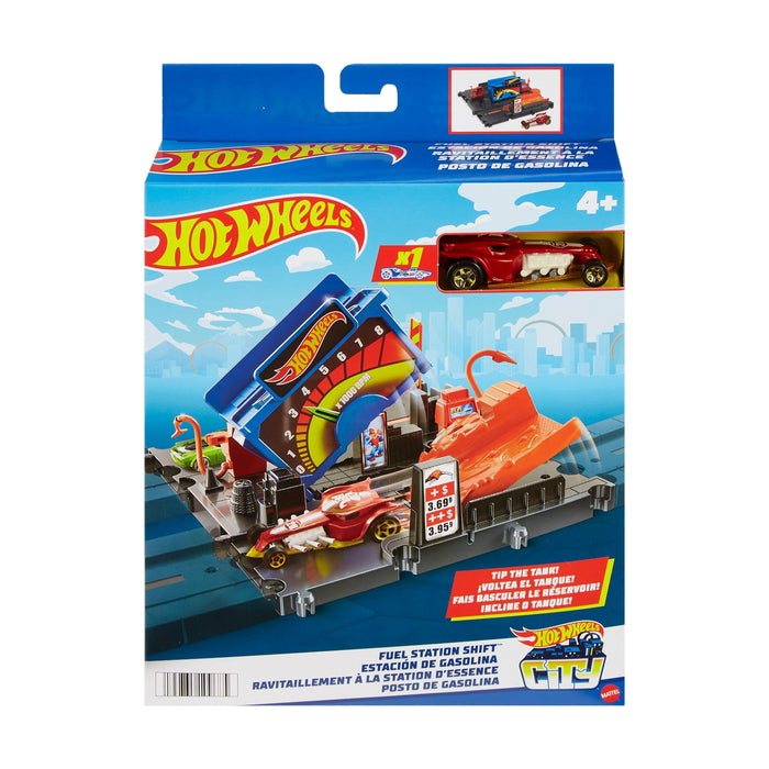Mattel Hot Wheels City Entry Playset packaging features a red toy car, colorful gas station-themed track, and illustrated Hot Wheels City background. For ages 4+. Text highlights interactive racing toy features.