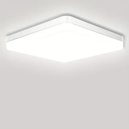 a white ceiling light with a square shape