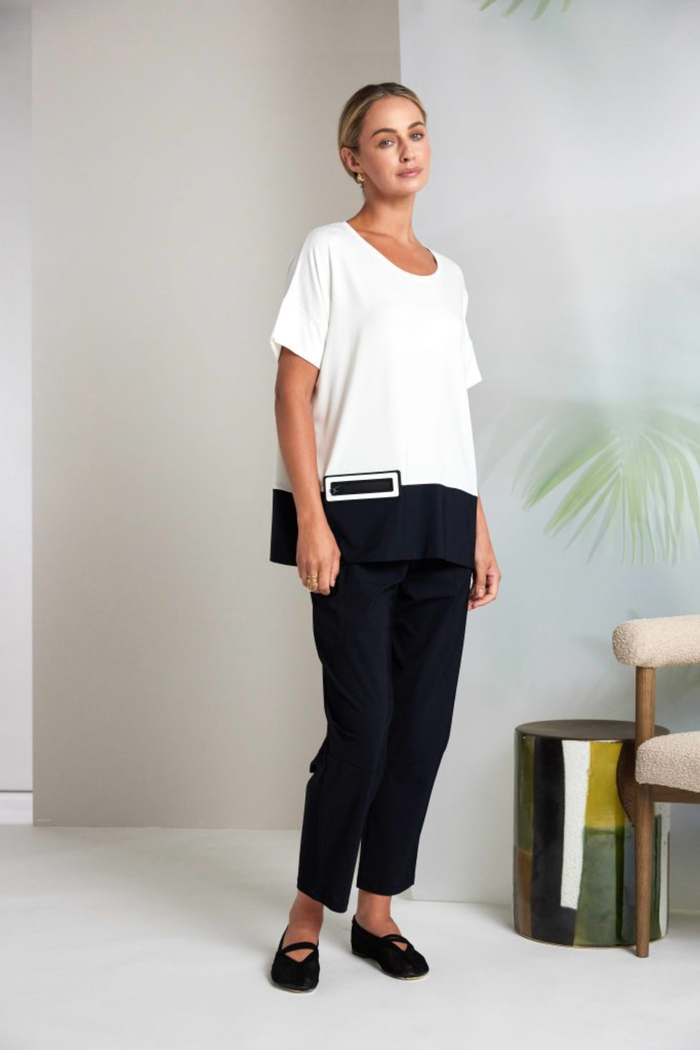 Black Naya pull-up trousers with a slim leg, stretch fabric and patch pockets. Comfortable, flattering and easy to wear. Shop now at Dotique.