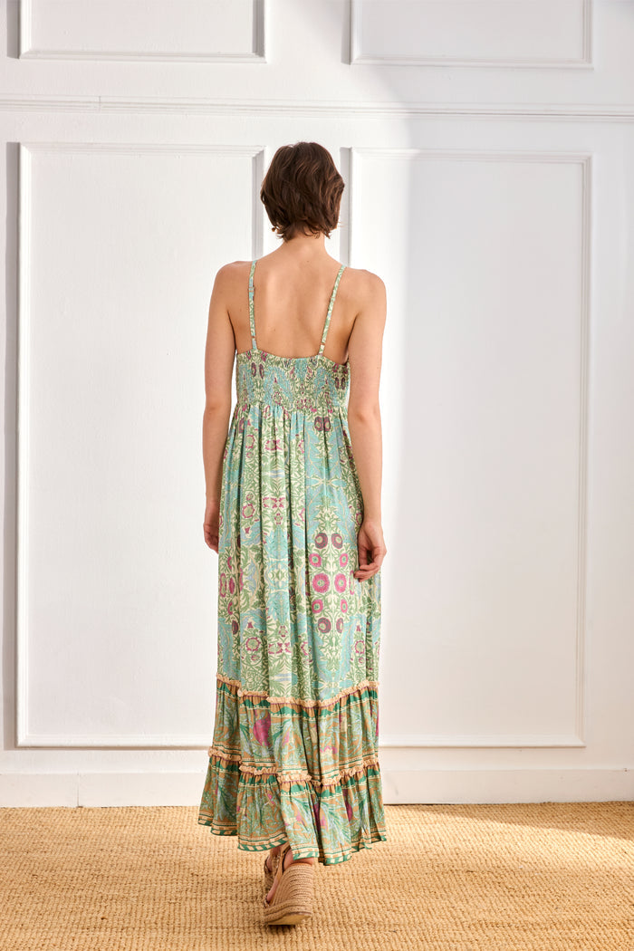 Rear view of model wearing NKN Nekane Jomi  Aqua Long Viscose Dress with Botanical Print by nkn nekane, shop Dotique