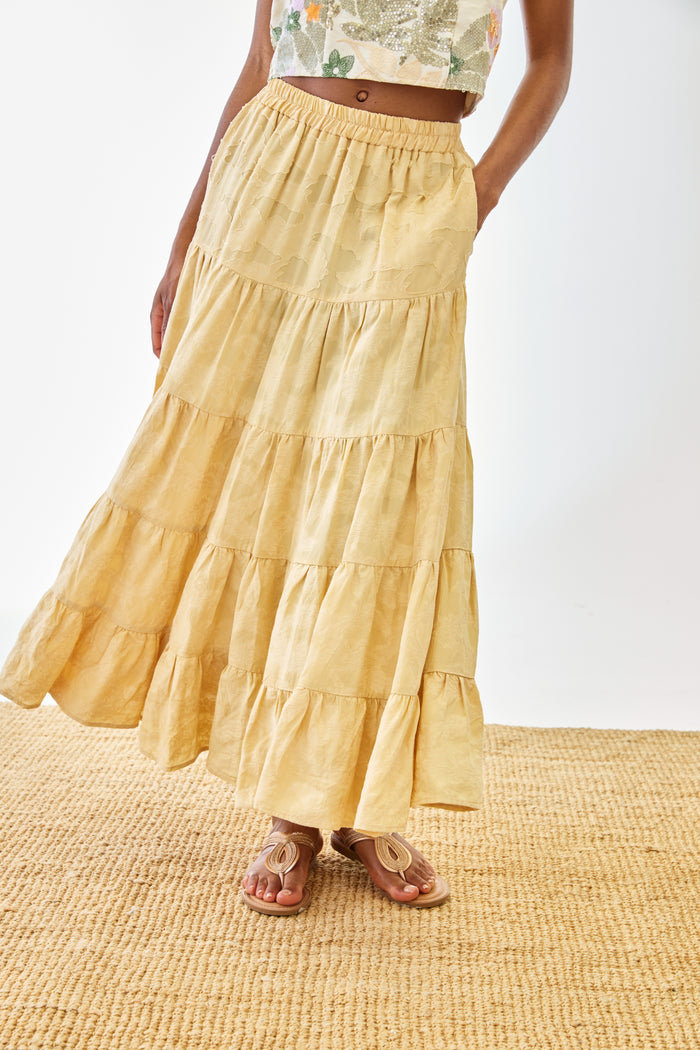 Woman wearing NKN Nekane Riloru Yellow Long Linen Ruffled Skirt by nkn nekane, shop nkn nekane at Dotique