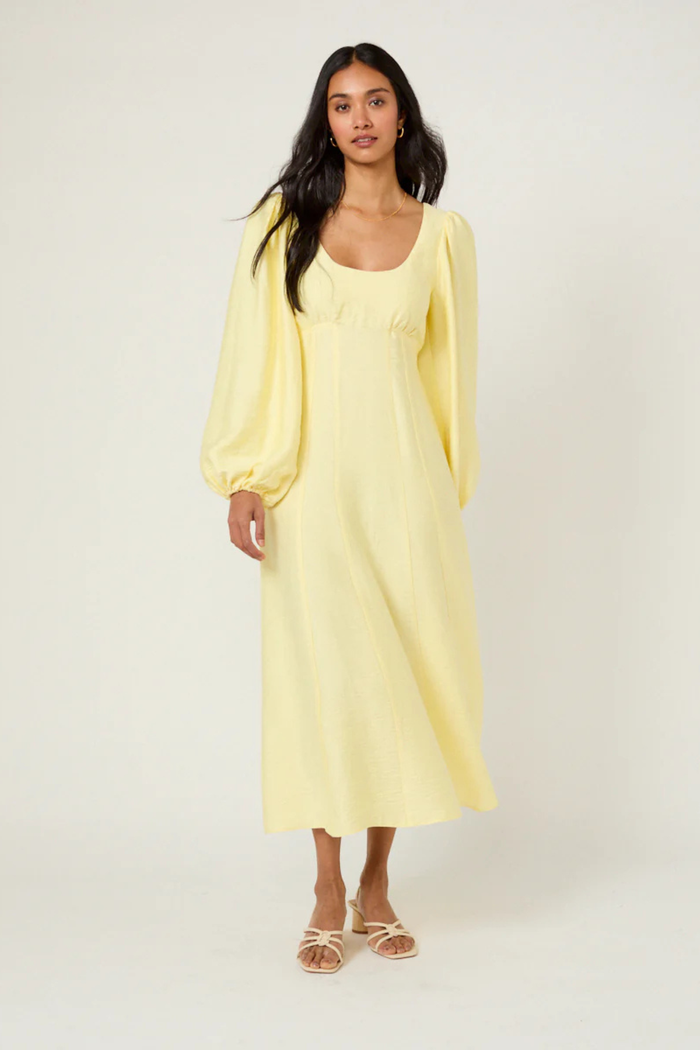 Nobody's Child Butter Yellow Bow Keyaa Midi Dress by nobody’s child worn with long puff sleeves shop nobody’s child at Dotique