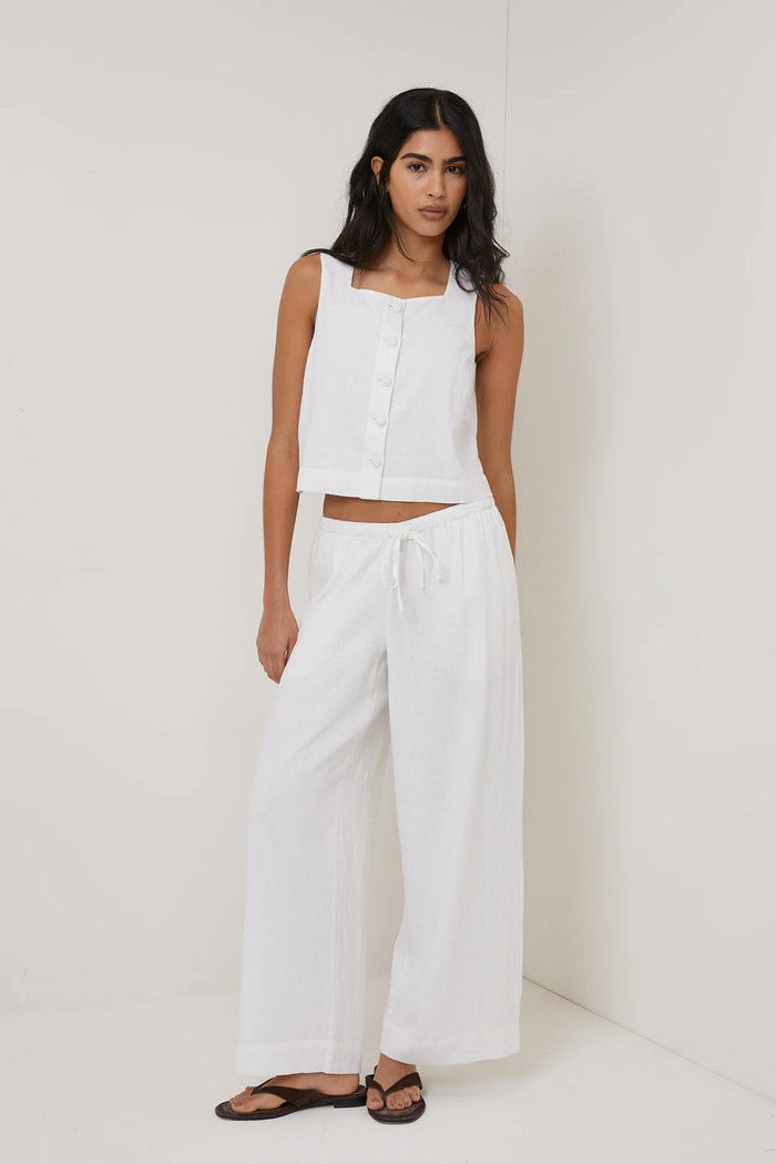 Model wearing Nobody's Child Sammie Linen Blend Button Front Tank Top White by Nobody’s Child shop at Dotique