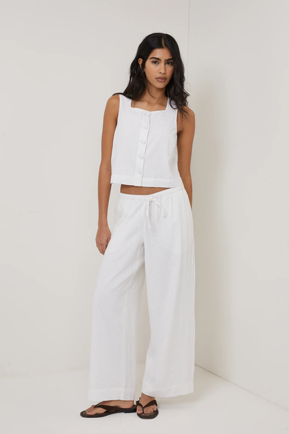 Model wearing Nobody's Child Sammie Linen Blend Button Front Tank Top White by Nobody’s Child shop at Dotique